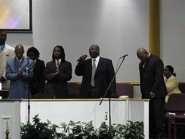 Darrell Durggin leading a song in the male choir @ Greater St. Peter AME